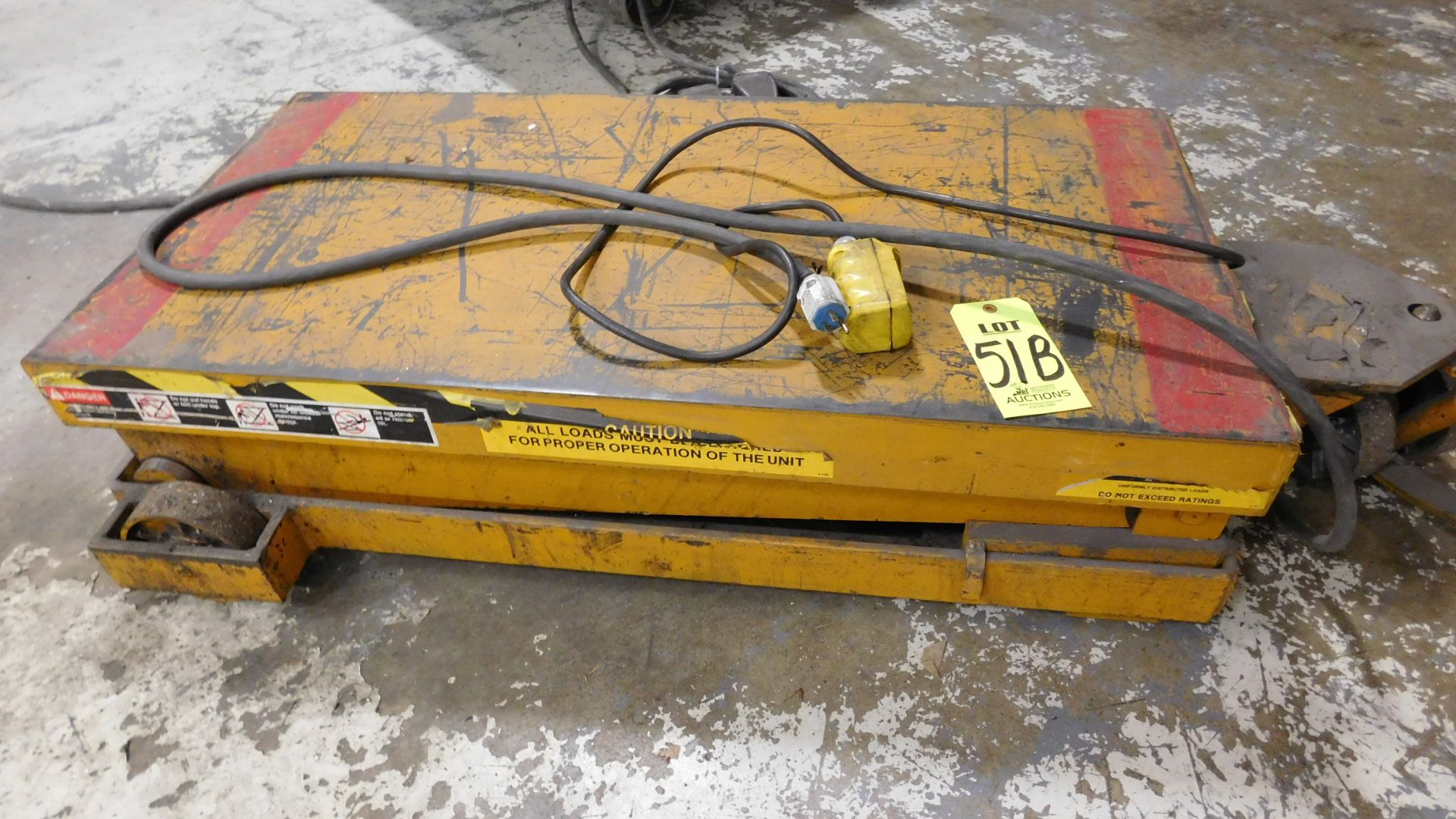 BISHAMON 2500 LB. ELECTRO-HYDRAULIC ELEVATING PLATFORM, 2' X 4', S/N 961709