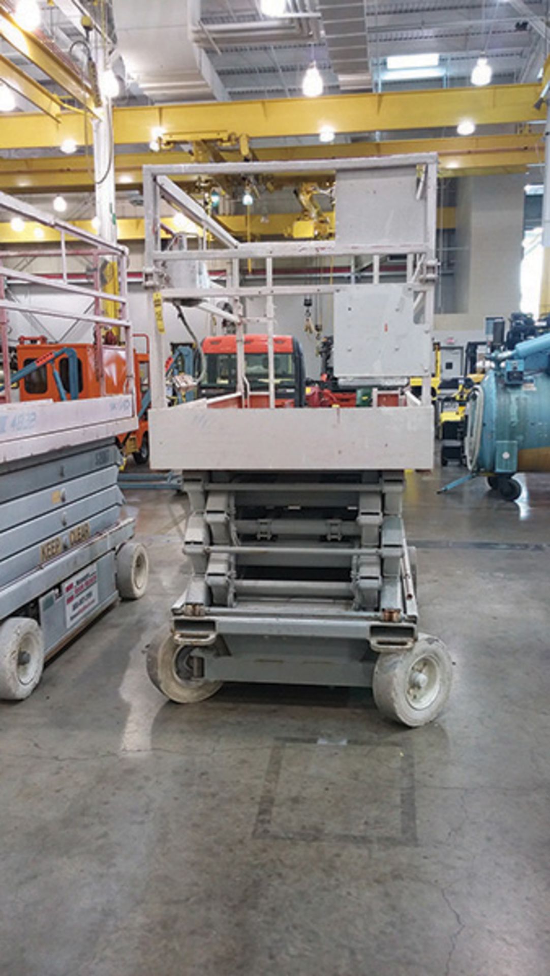 SKY JACK SCISSOR LIFT; MODEL 4832, ELECTRIC BUILT IN CHARGER