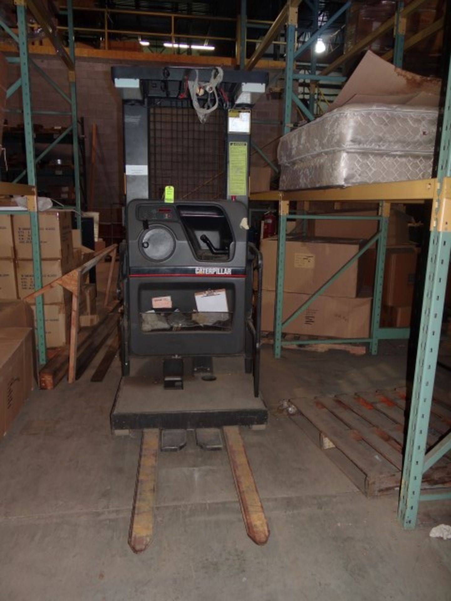 Caterpillar NOR30P Electric Order Picker. S/N 2LL-02878. Capacity 3000 Lbs. Along with Exide Charger
