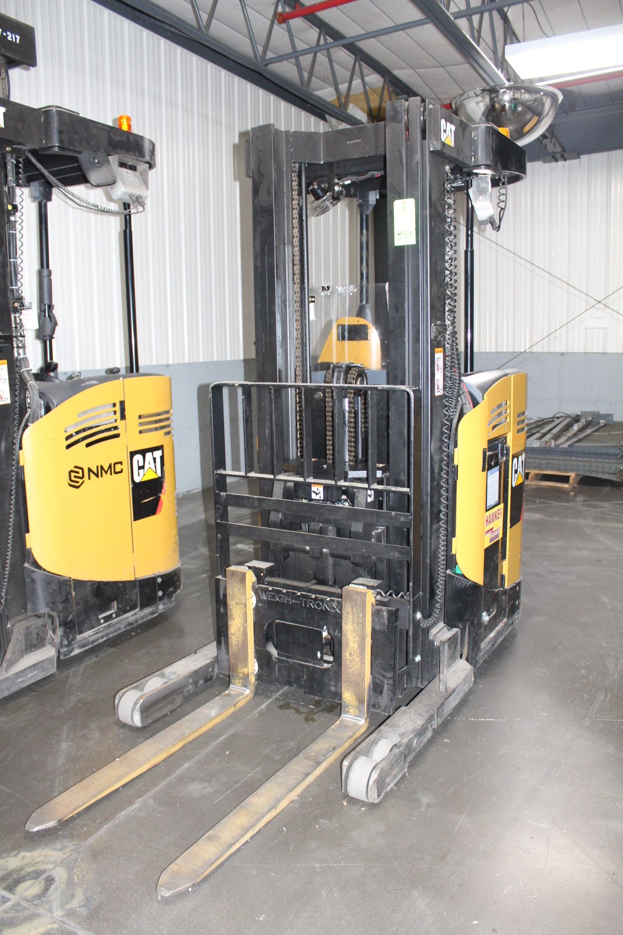 Caterpillar Model NR3000-36V 3,000 Lb. Capacity Narrow Aisle Stand-Up Rider Electric Forklift, S/N