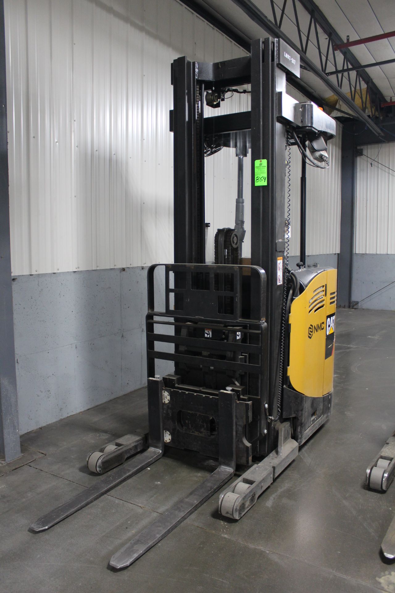 Caterpillar Model NR3000-36V 3,000 Lb. Capacity Narrow Aisle Stand-Up Rider Electric Forklift, S/N