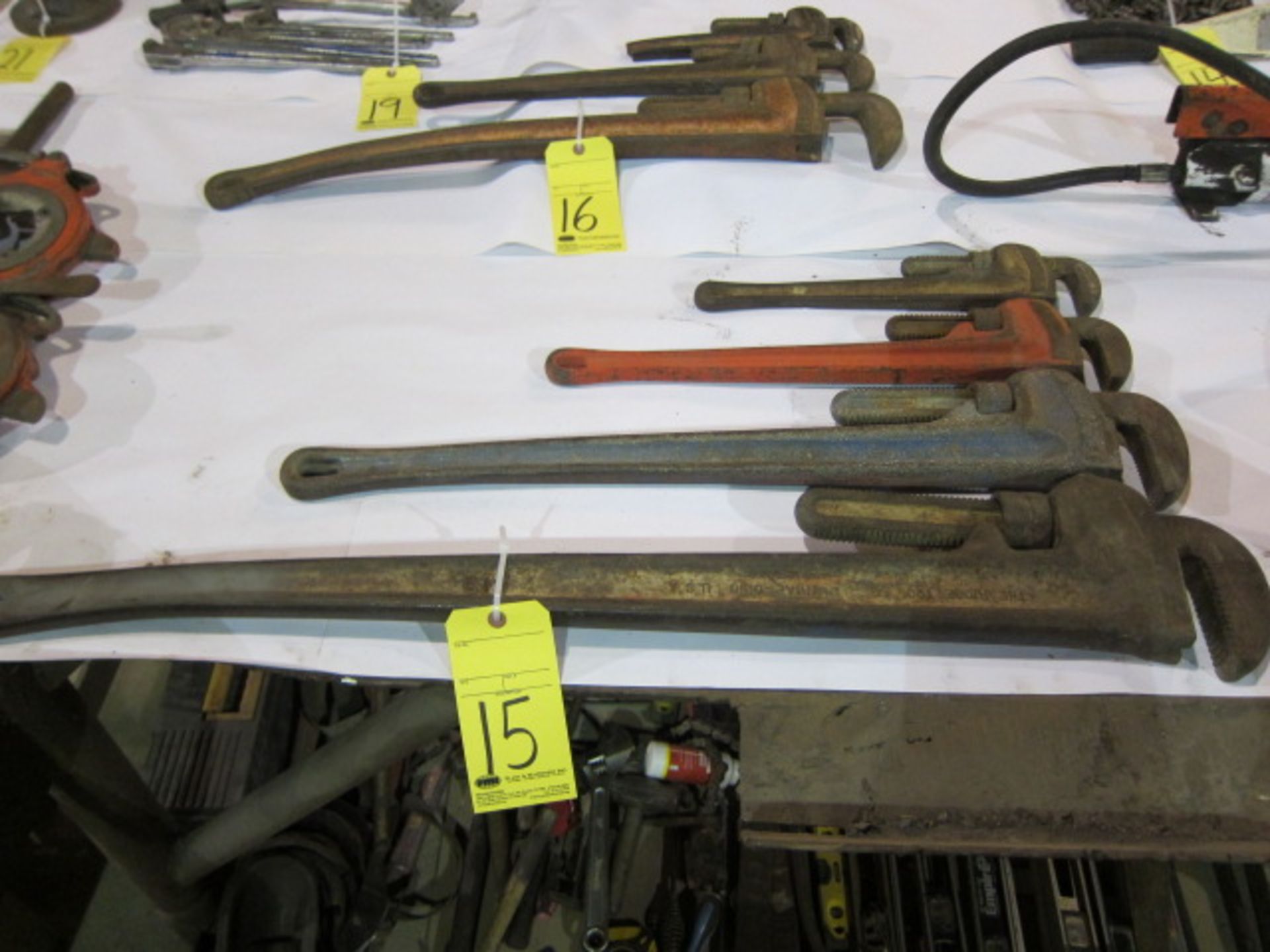 LOT OF PIPE WRENCHES (4)