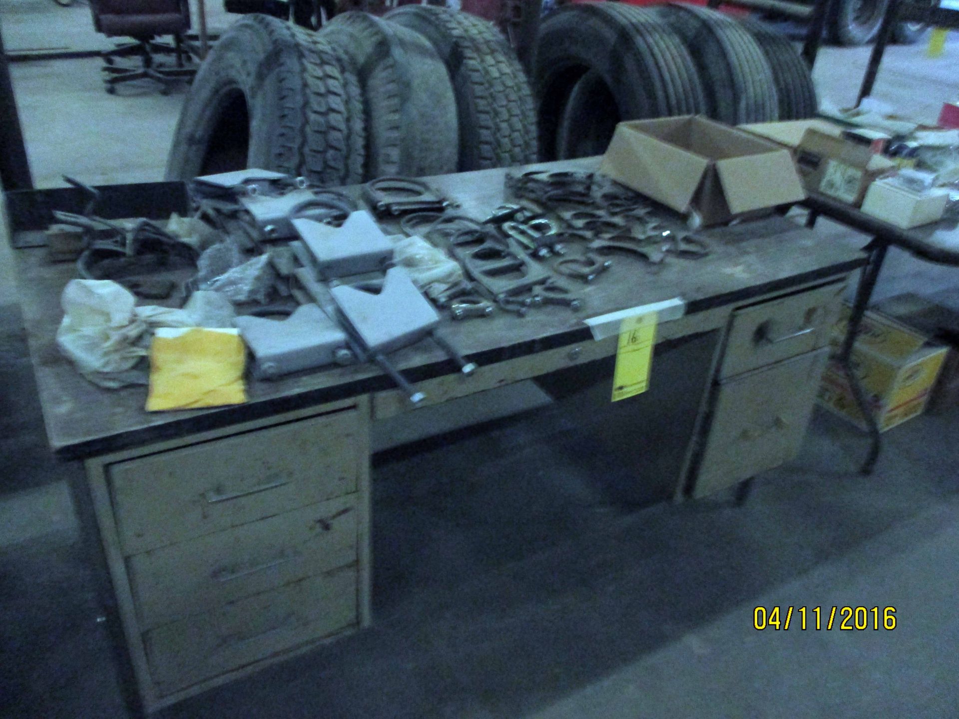 LOT CONSISTING OF: muffler clamps & 5th wheel jaws (on one desk) - Image 2 of 2