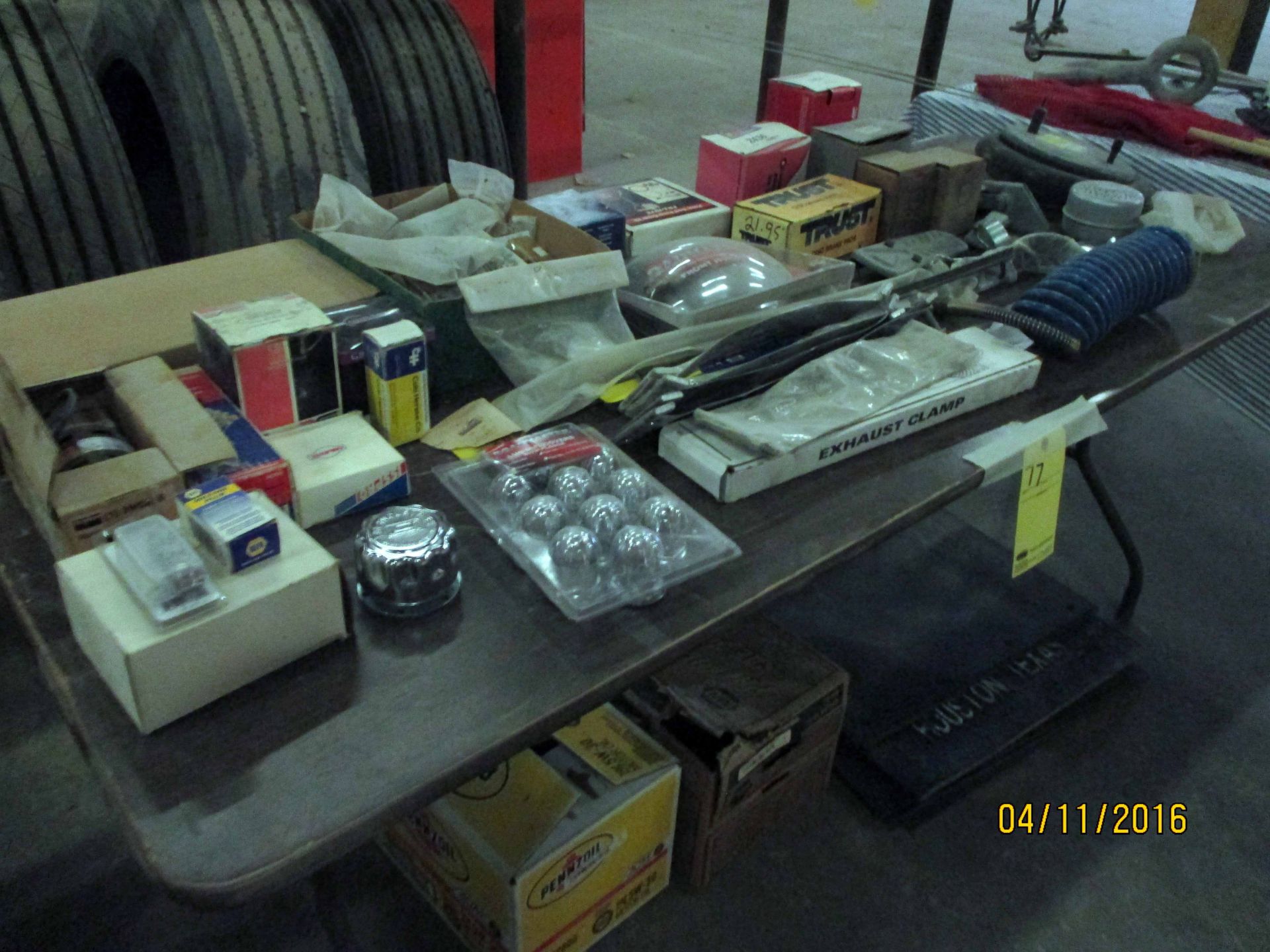 LOT CONSISTING OF: truck parts, engine oil, mud flaps (on folding table) - Image 2 of 2