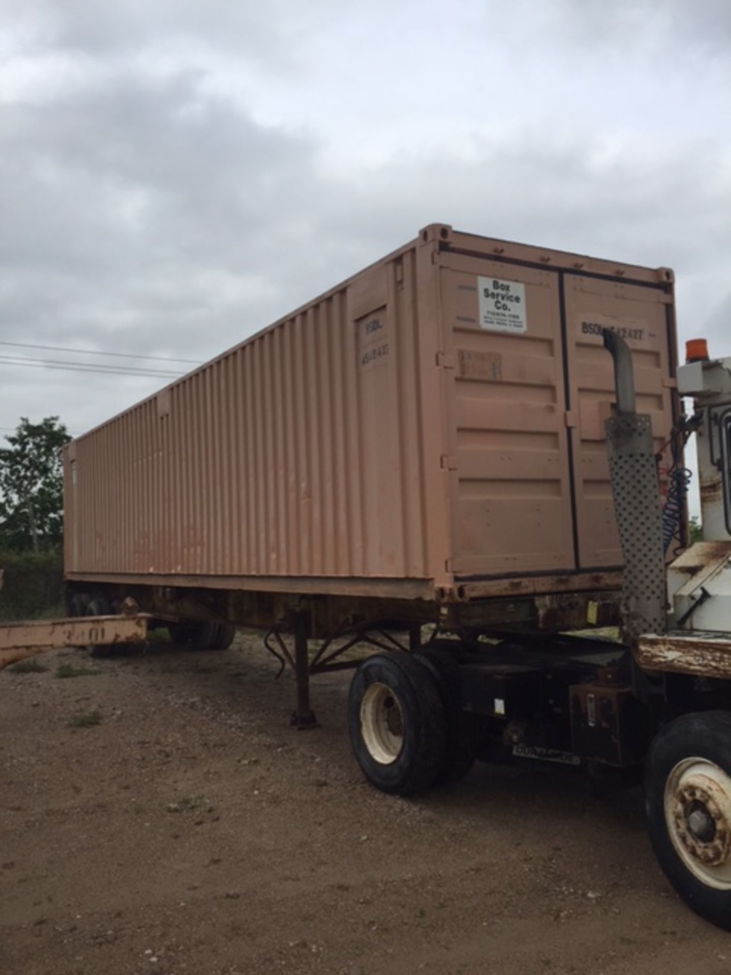 STEEL STORAGE CONTAINER, 40' L X96"W. X 8' ht., dbl. swing-out front doors, man door, reconditioned,