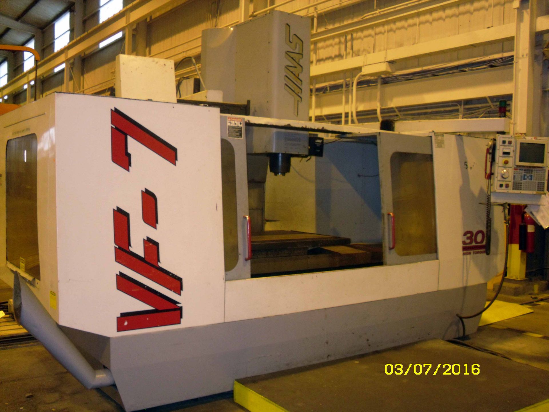 CNC VERTICAL MACHINING CENTER, HAAS MDL. VF7, new 3/1998, Haas CNC control, 28" x 84" table, 4,000