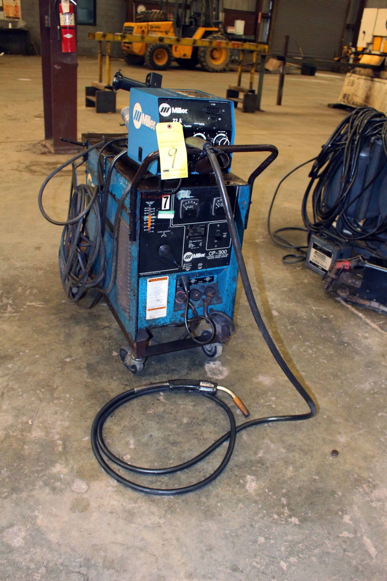 MIG WELDER, MILLER MDL. CP302, 300 amps @ 32 v., 100% duty cycle, Mdl. 22A wire feeder, S/N