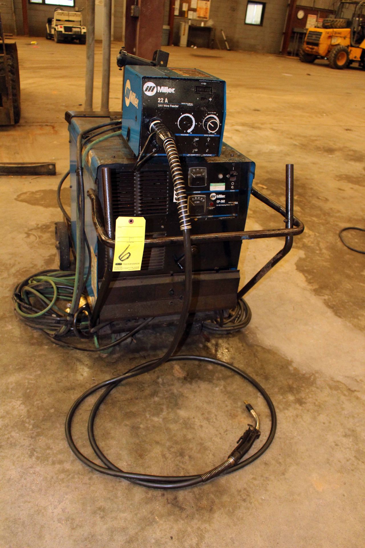 MIG WELDER, MILLER MDL. CP302, 300 amps @ 32 v., 100% duty cycle, Mdl. 22A wire feeder, running