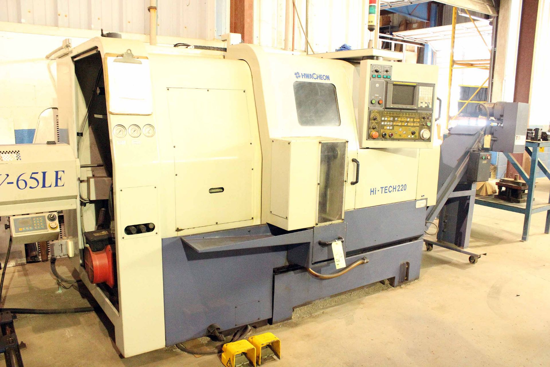 CNC LATHE, HWACHEON MDL. HI-TECH-220, new 2004, Fanuc 18T CNC control, 19.7" sw. over bed, 13.8"