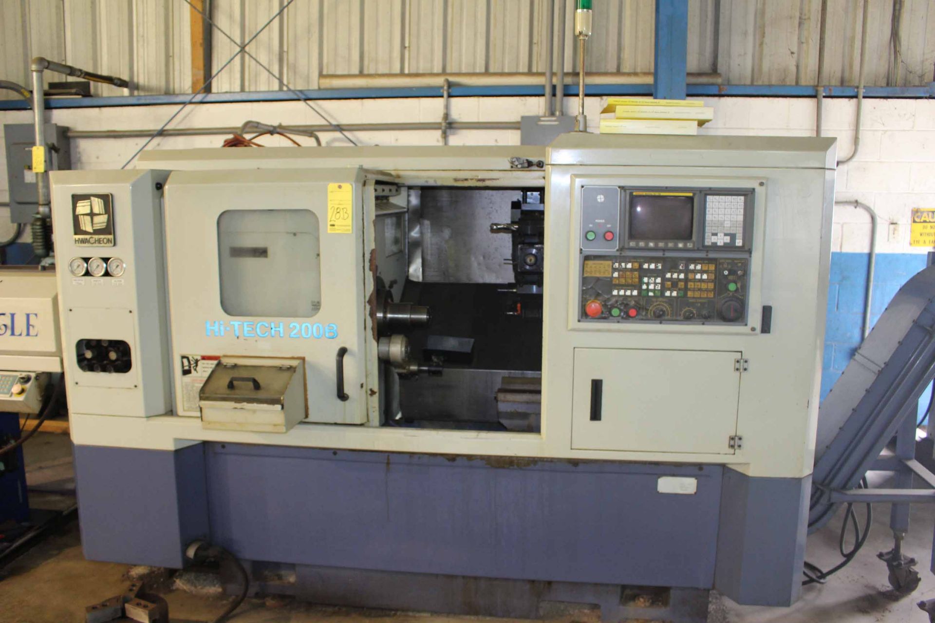 CNC LATHE, HWACHEON MDL. HI-TECH-200, new 2004, Fanuc 0i-TB CNC control, 19.7" sw. over bed, 13.8"