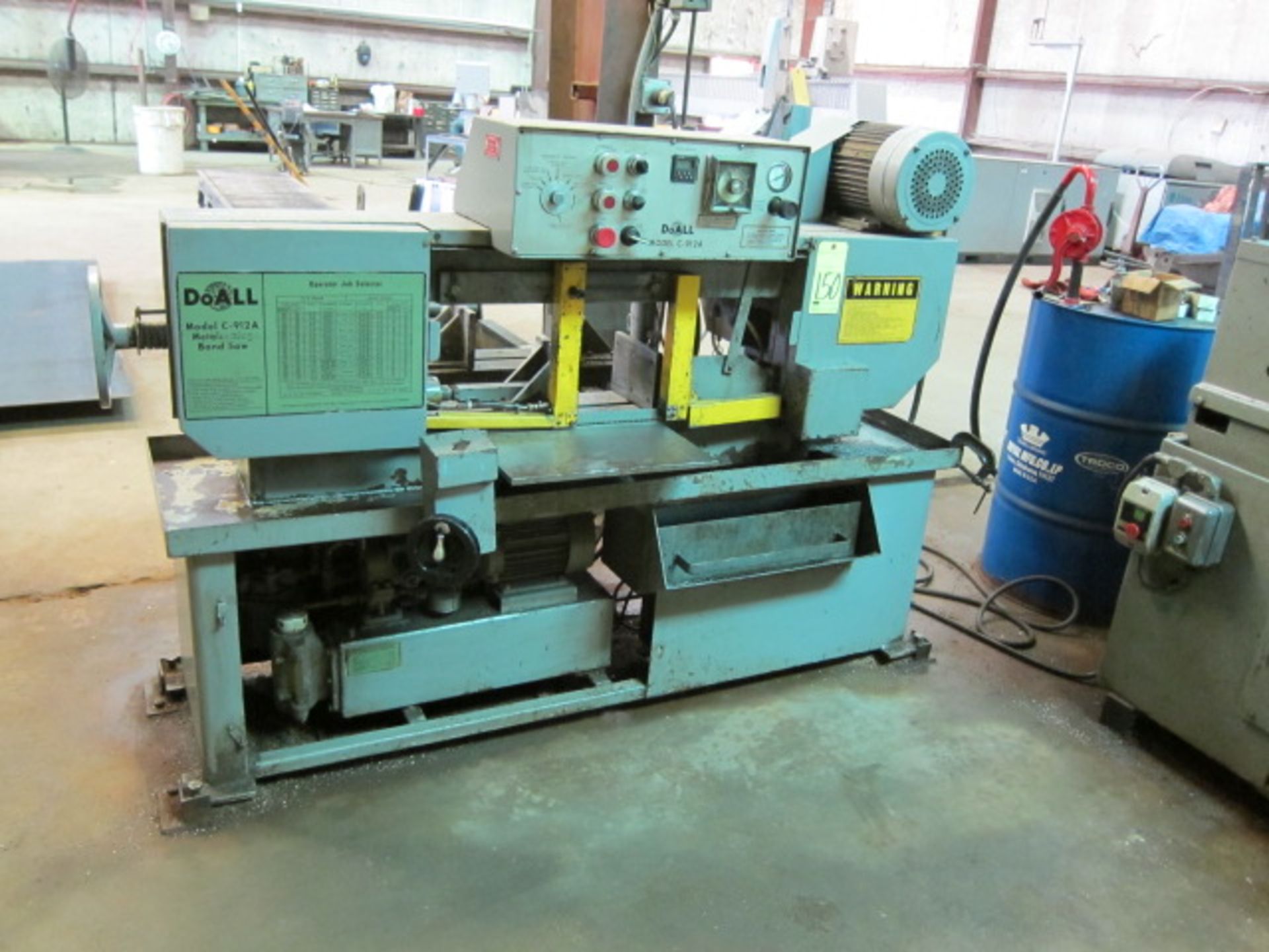 HORIZONTAL BANDSAW, DOALL MDL. C-912A, 9" rd. cap., 9" x 12" rect. cap., auto. feed, H.D. infeed