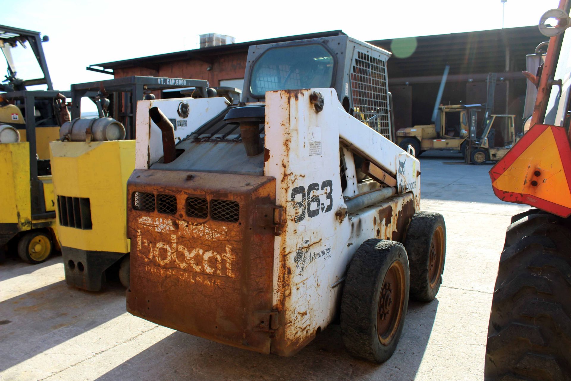 SKID STEER LOADER, BOBCAT MDL. 863, Bobcat Mdl. B950 jackhammer, (loader) S/N 562219111.(jackhammer)