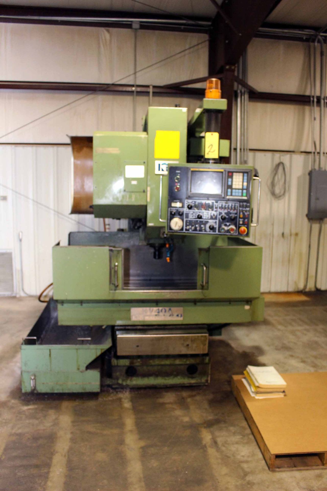 CNC VERTICAL MACHINING CENTER, KIA MDL. KV40A-0MB, new 11/1989, Fanuc OM-B CNC control, 24" x 14"