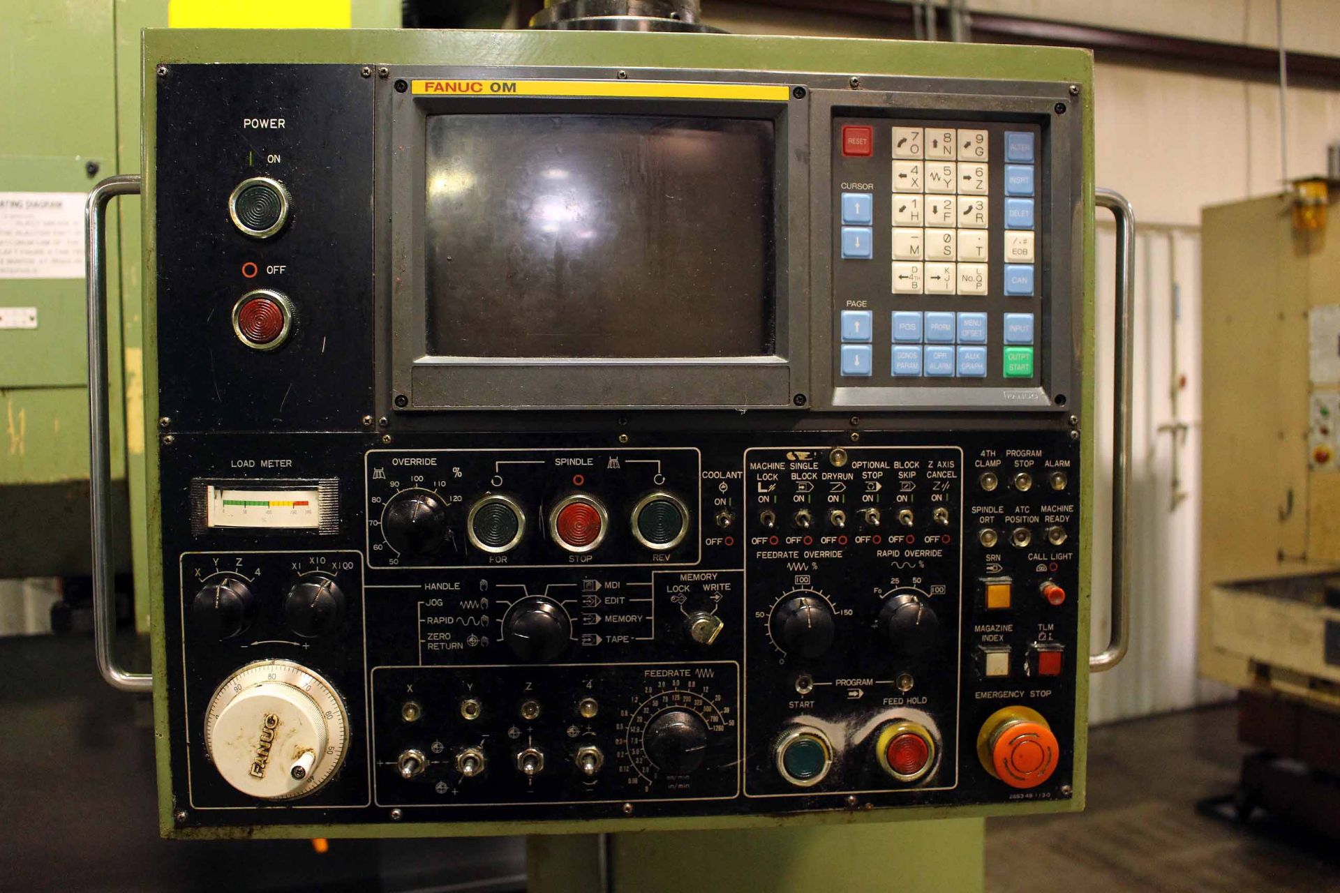 CNC VERTICAL MACHINING CENTER, KIA MDL. KV40A-0MB, new 11/1989, Fanuc OM-B CNC control, 24" x 14" - Image 4 of 4