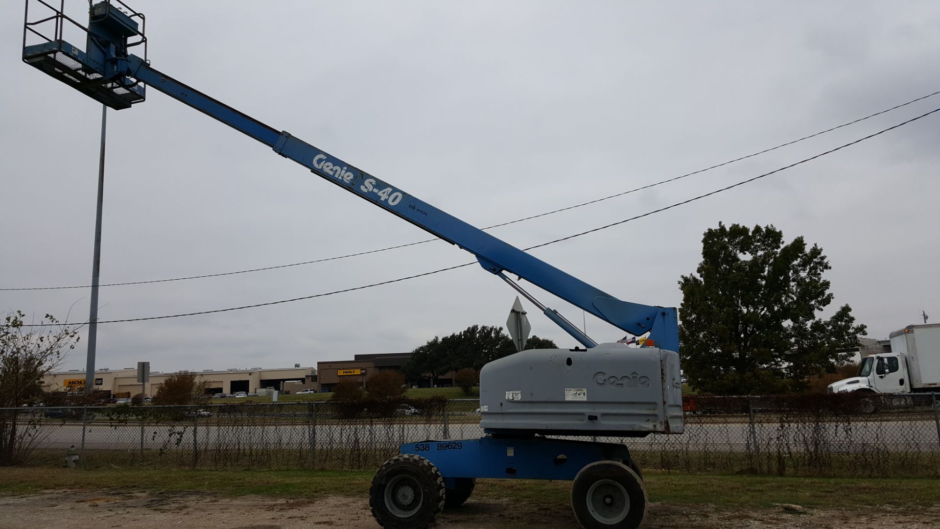TELESCOPING BOOM MANLIFT, GENIE MDL. S40, new 1998, 40' 2-section boom lift, Ford 4 cyl. LPG engine,