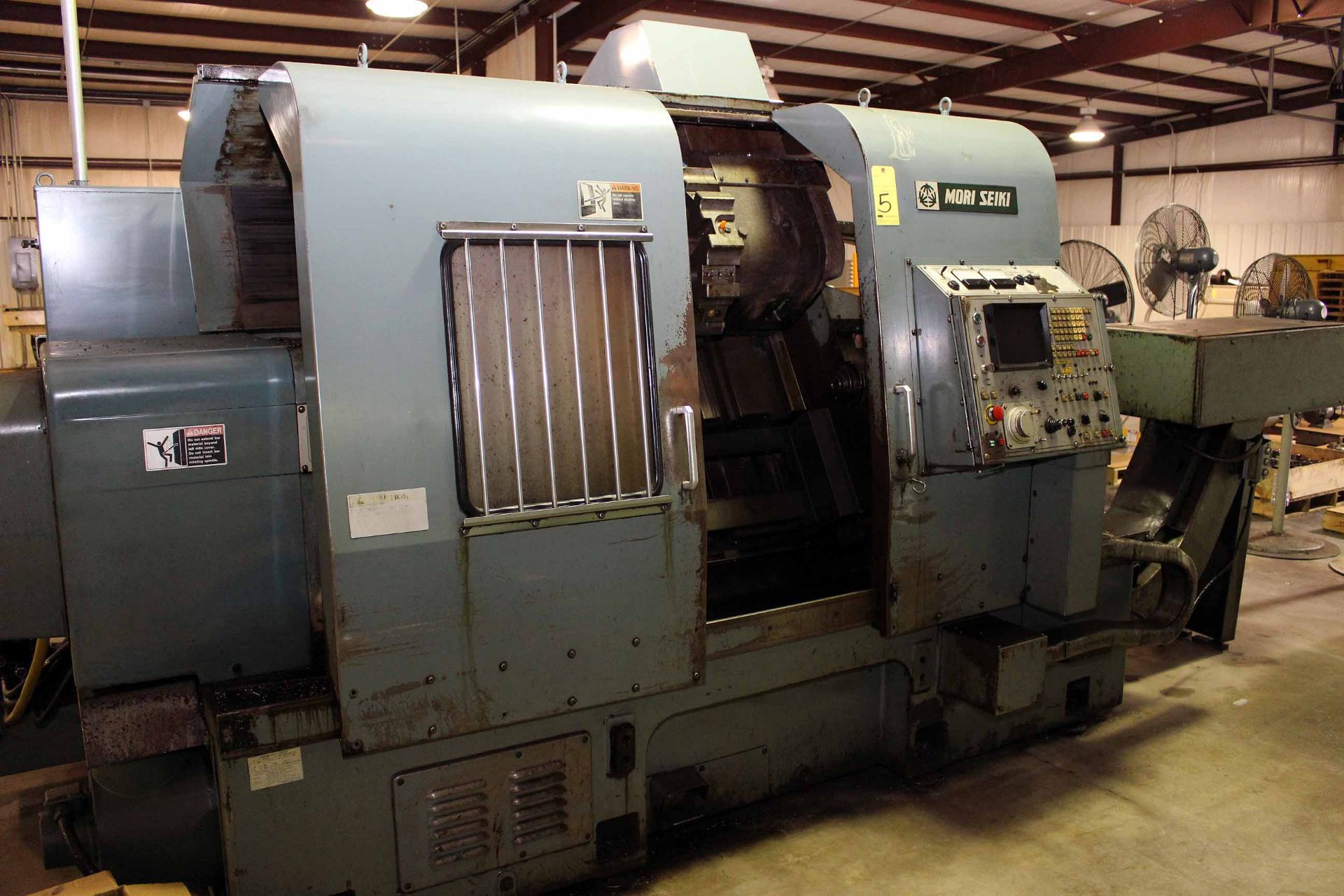 CNC LATHE, MORI SEIKI MDL. SL-5, (est) new 1980's, 12" chuck, 40" dist. btn. centers, chip conveyor,