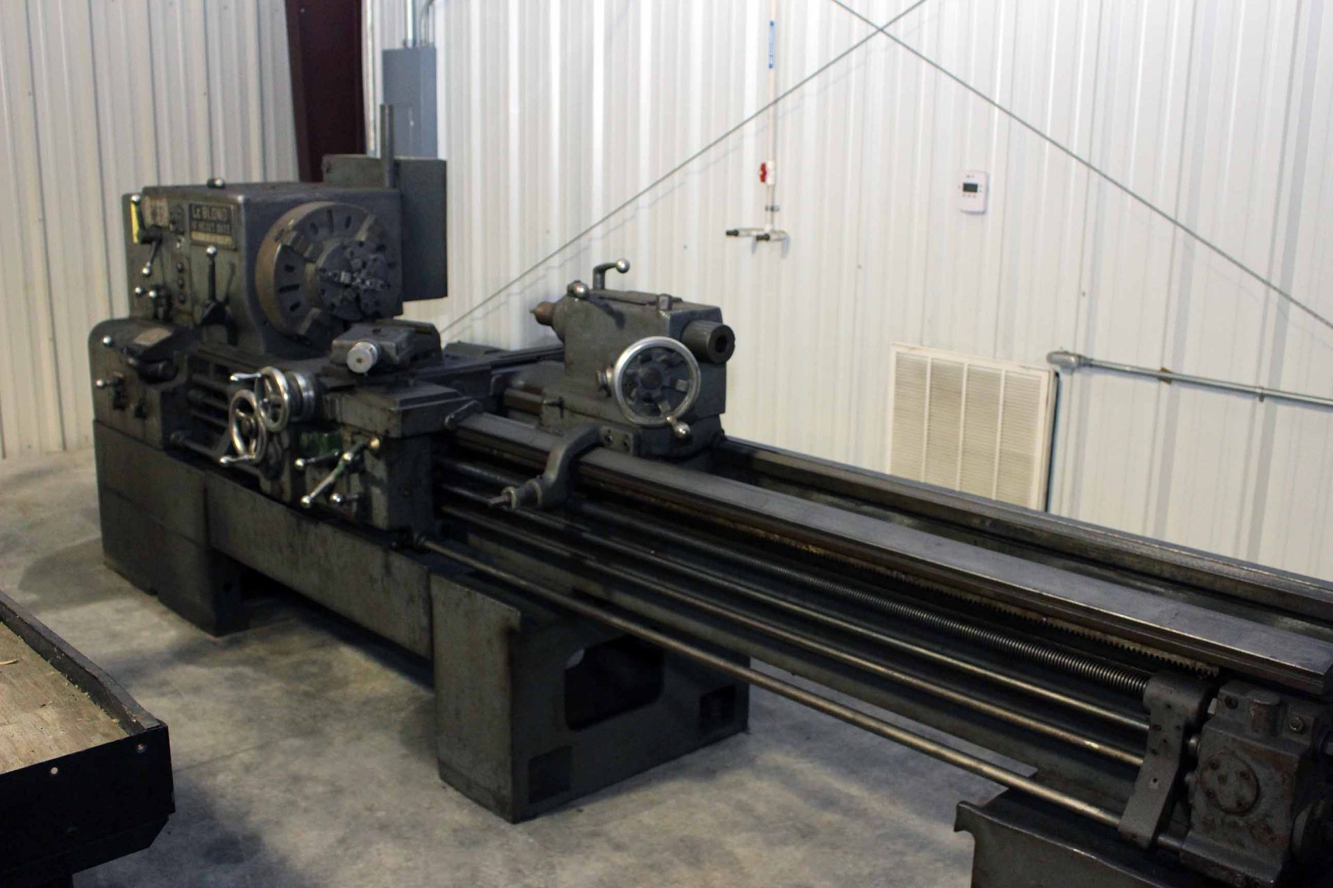 HEAVY DUTY ENGINE LATHE, LEBLOND 16", 18" chuck, 108" dist. btn. centers, taper attach.,