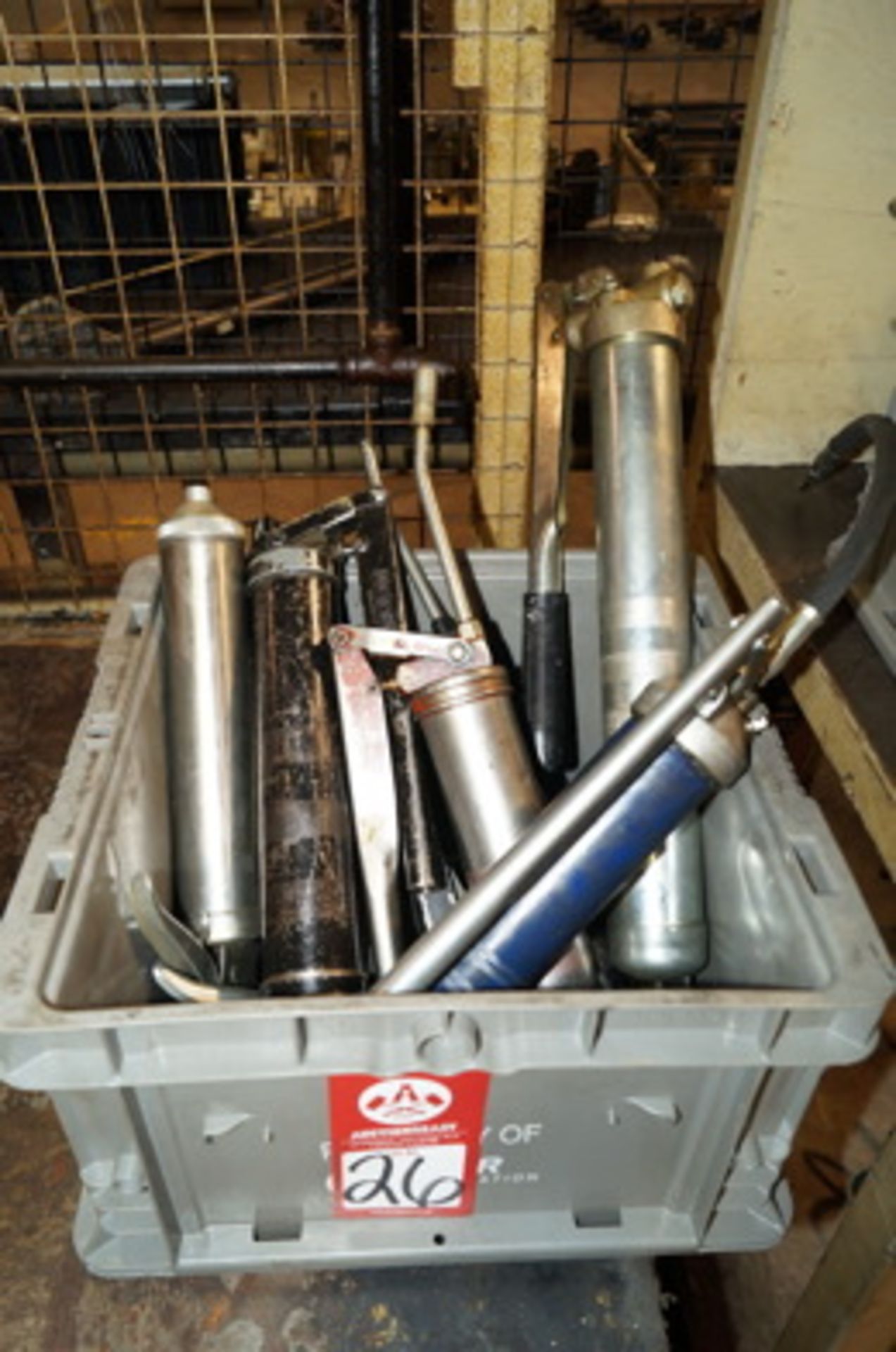 Bin of Grease Guns