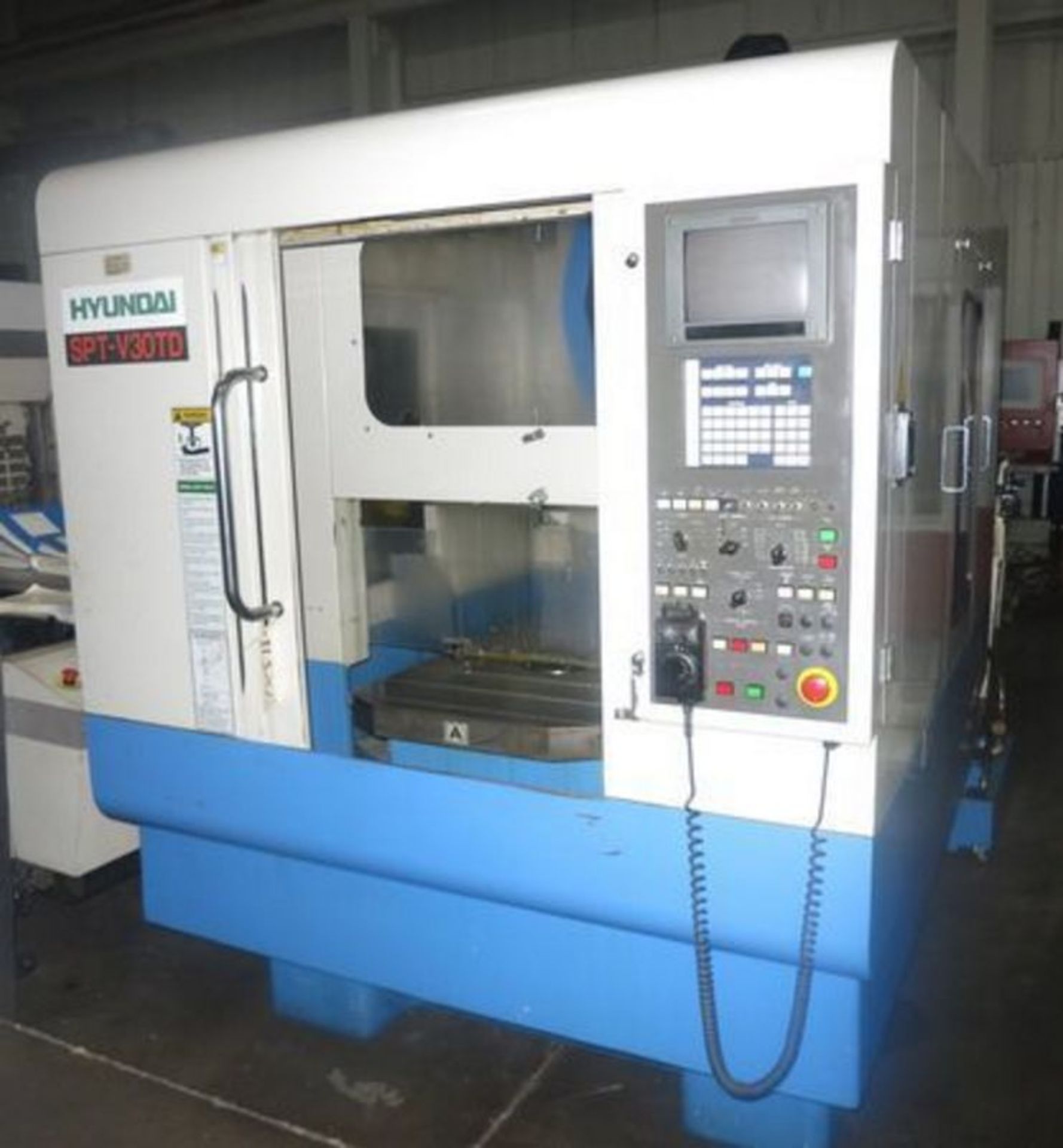 HYUNDAI MODEL SPTV30TD CNC TAPMILL CENTER WITH PALLET CHANGER, S/N 73H8056, NEW 1999 Table size 35.