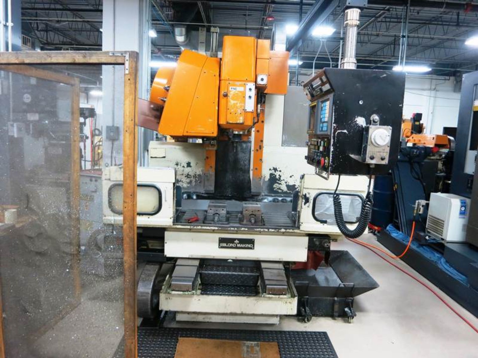 LEBLOND MAKINO FNC-74-A20CAT 4-AXIS CNC VERTICAL MACHINING CENTER, S/N V3011, NEW 1990 General