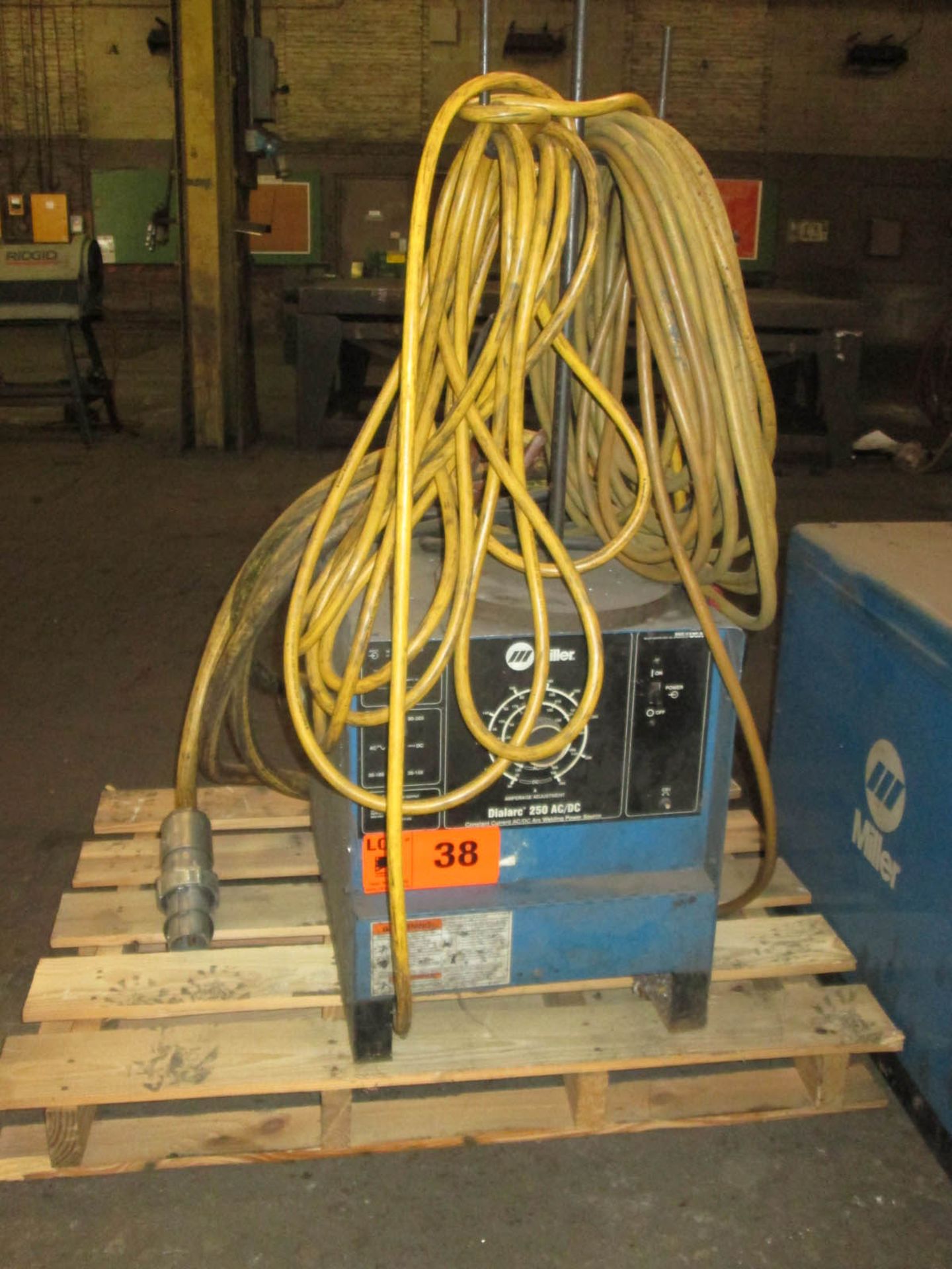 MILLER DIALARC 250 AC/DC ARC WELDER WITH CABLES S/N: KG259987