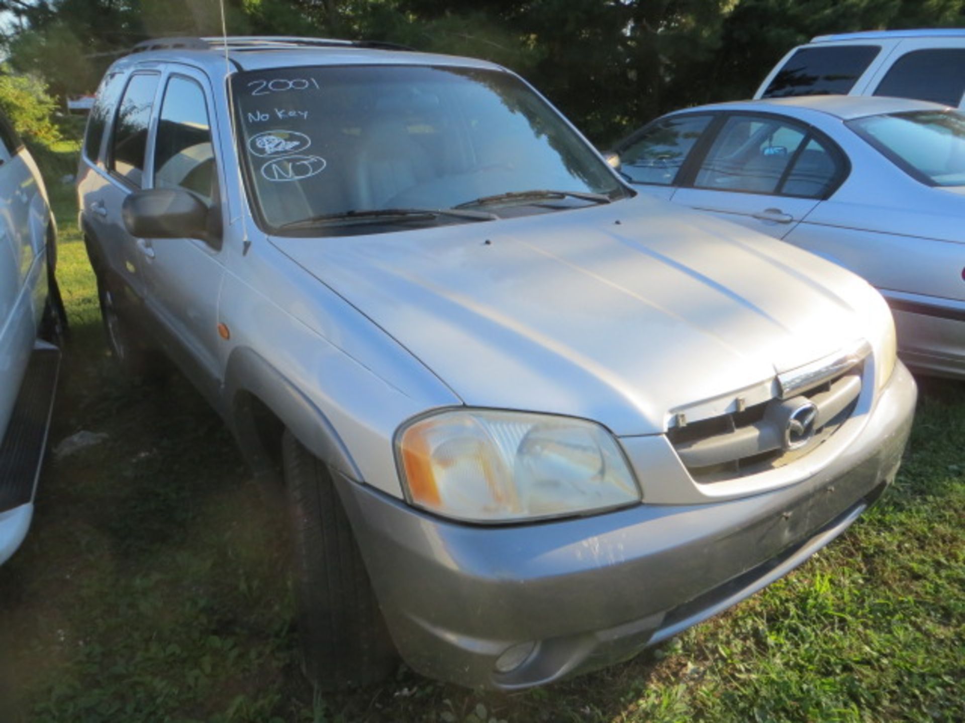 2001 MAZDA TRIBUTE ES-V6- UKNOWN MILES,VIN 4F2CU08181KM31349, SOLD WITH GOOD TRANSFERABLE TITLE