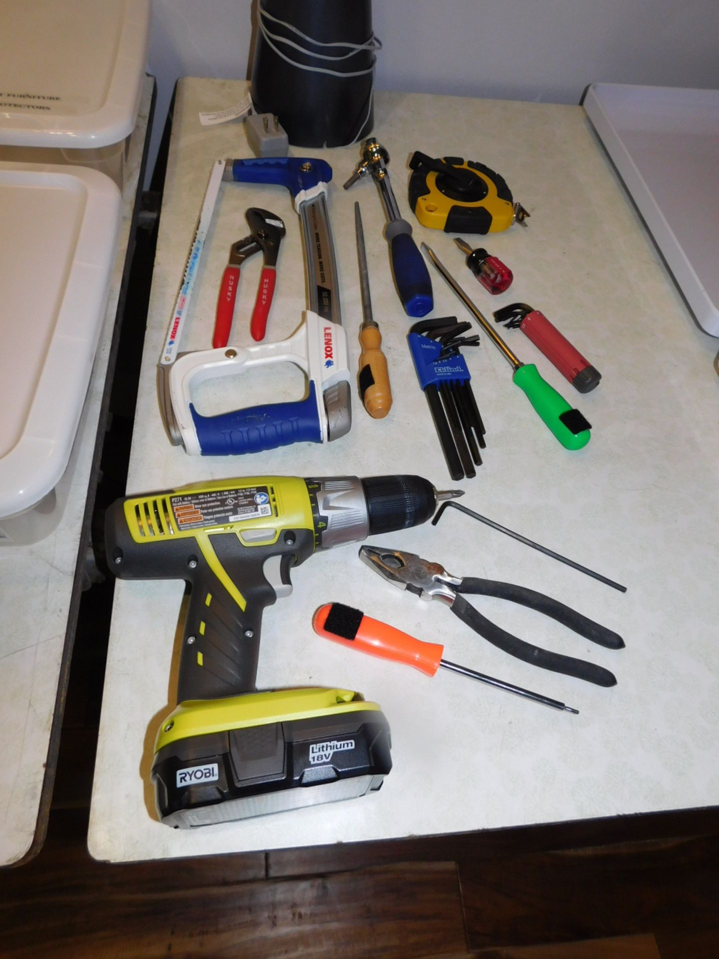 ASSORTMENT OF HAND TOOLS, TAPES, RYOBI DRILL WITH CHARGER, SOME TOOLS MAY BE GONE, OTHERS ADDED