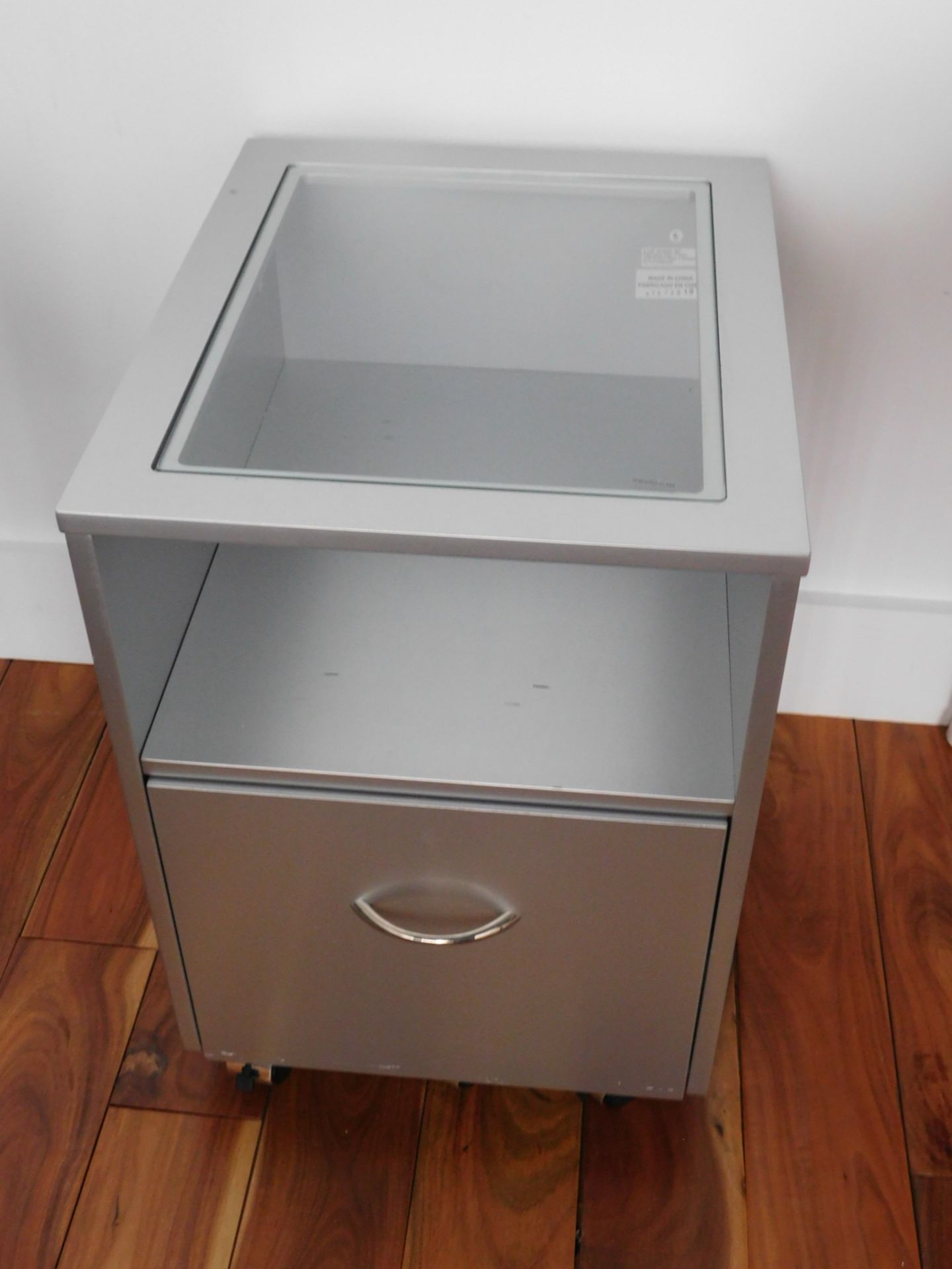 ROLLING GLASS TOP FILE CABINET