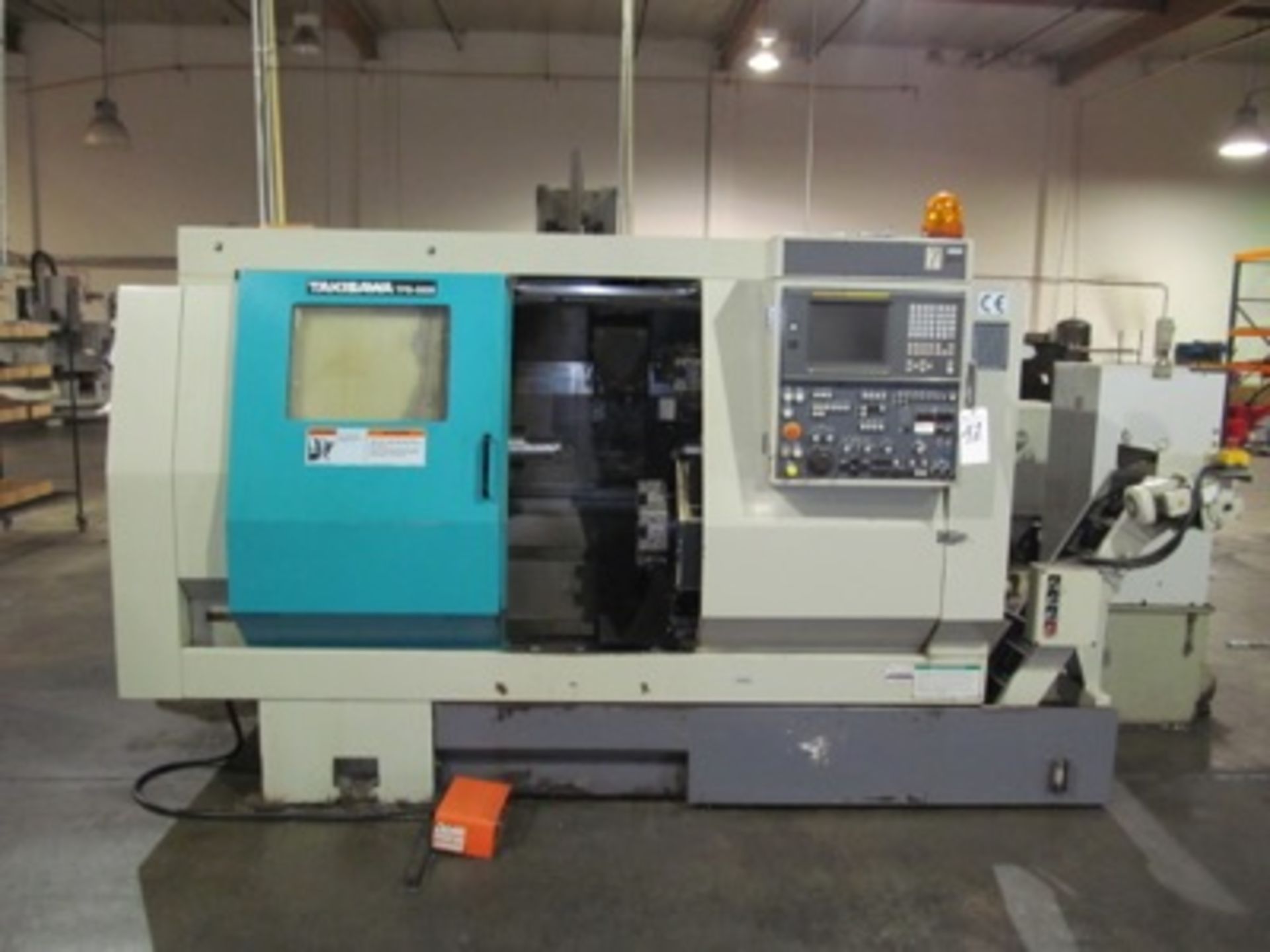 Takisawa mod. TPS-5000, 4-Axis Twin Spindle Turning Center w/ Vertical Milling Head, Twin 8-Post