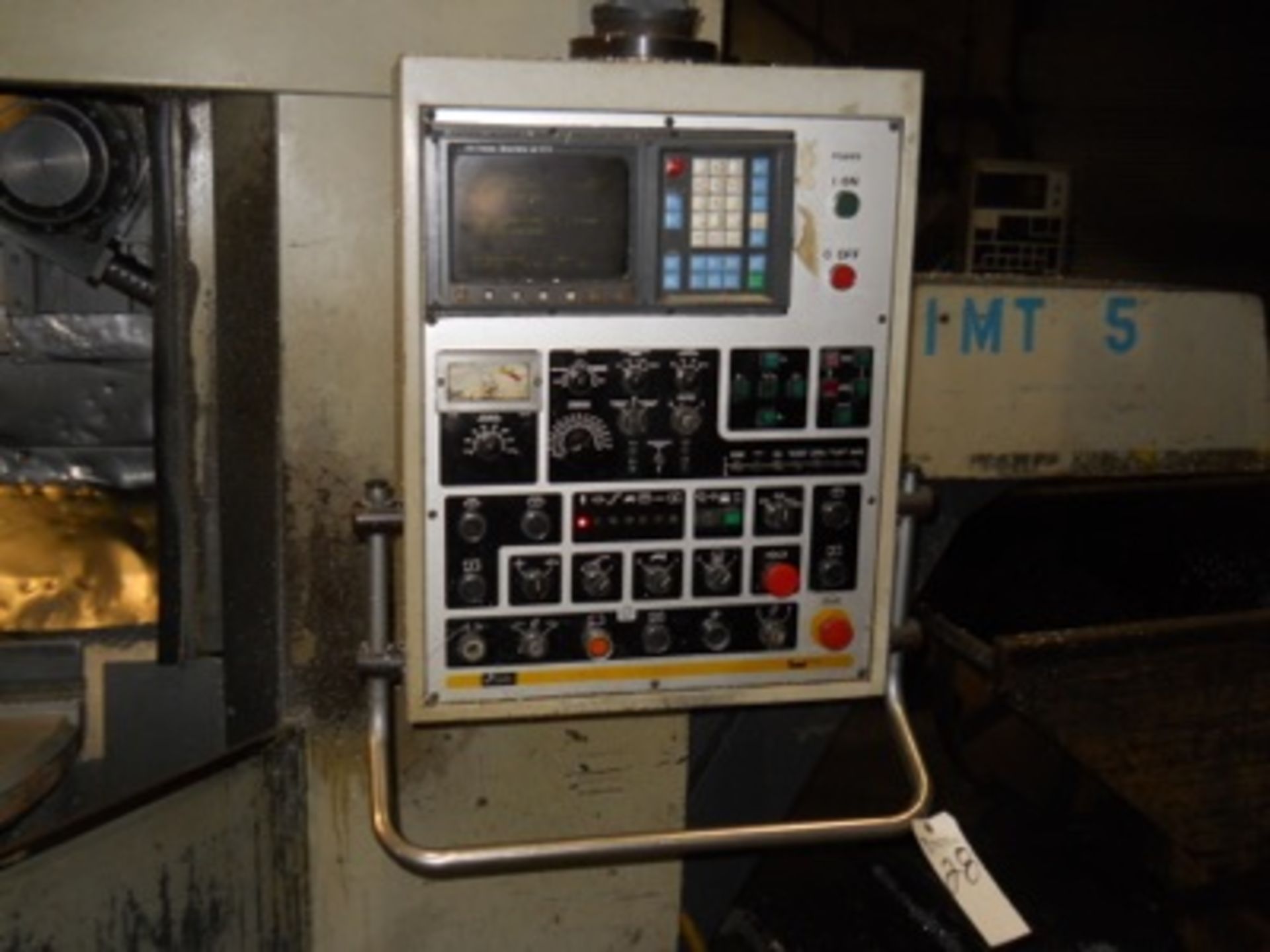 (1992) IMT mod. SF-500-4 Vertical 4-Axis CNC Lathe w/ GE Fanuc Series O-TT CNC Controls w/ 2-