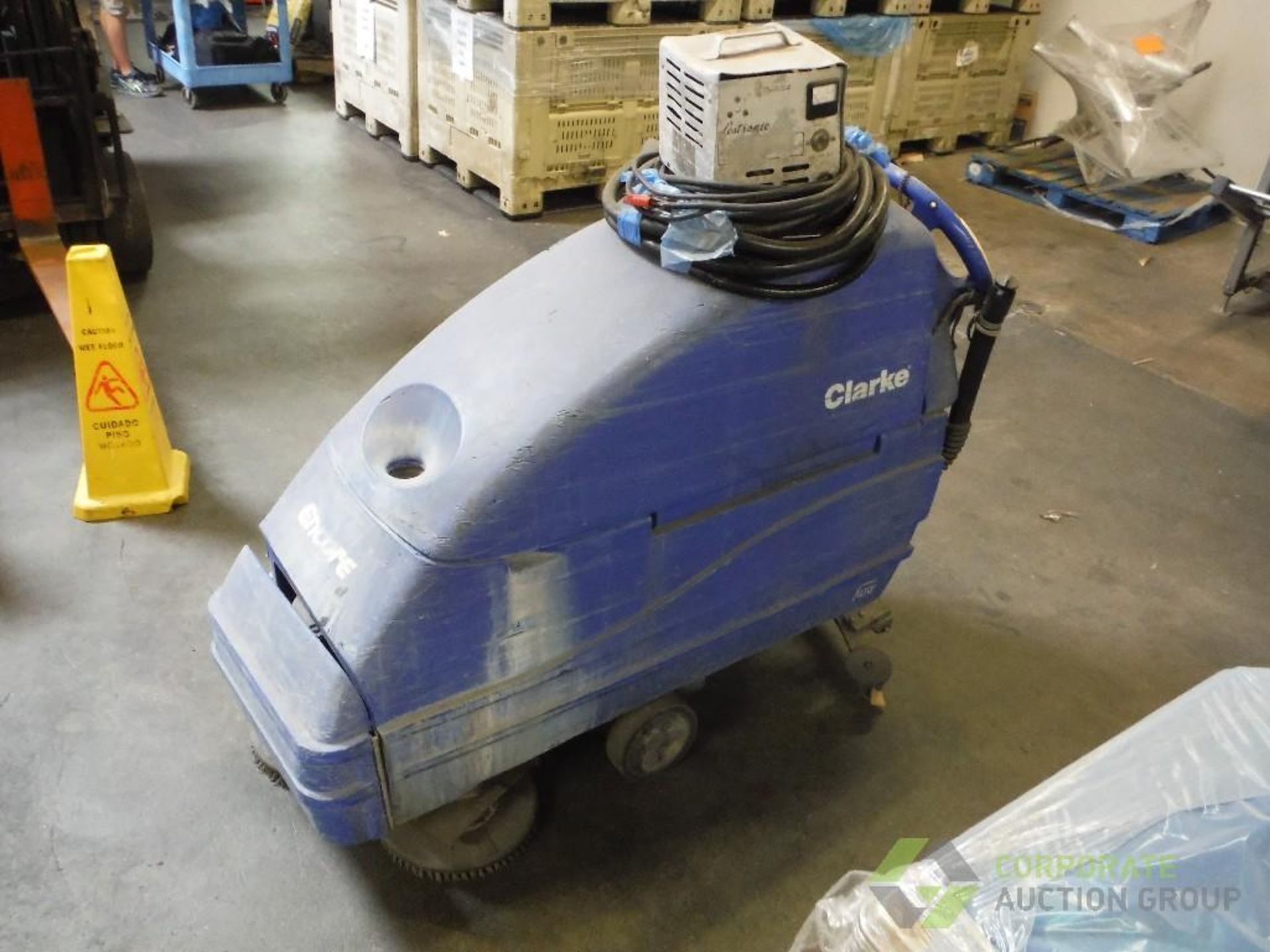 Clarke walk behind floor scrubber, Model Encore L24263300AHPADS, SN CJ1131, 24 volt, with charger