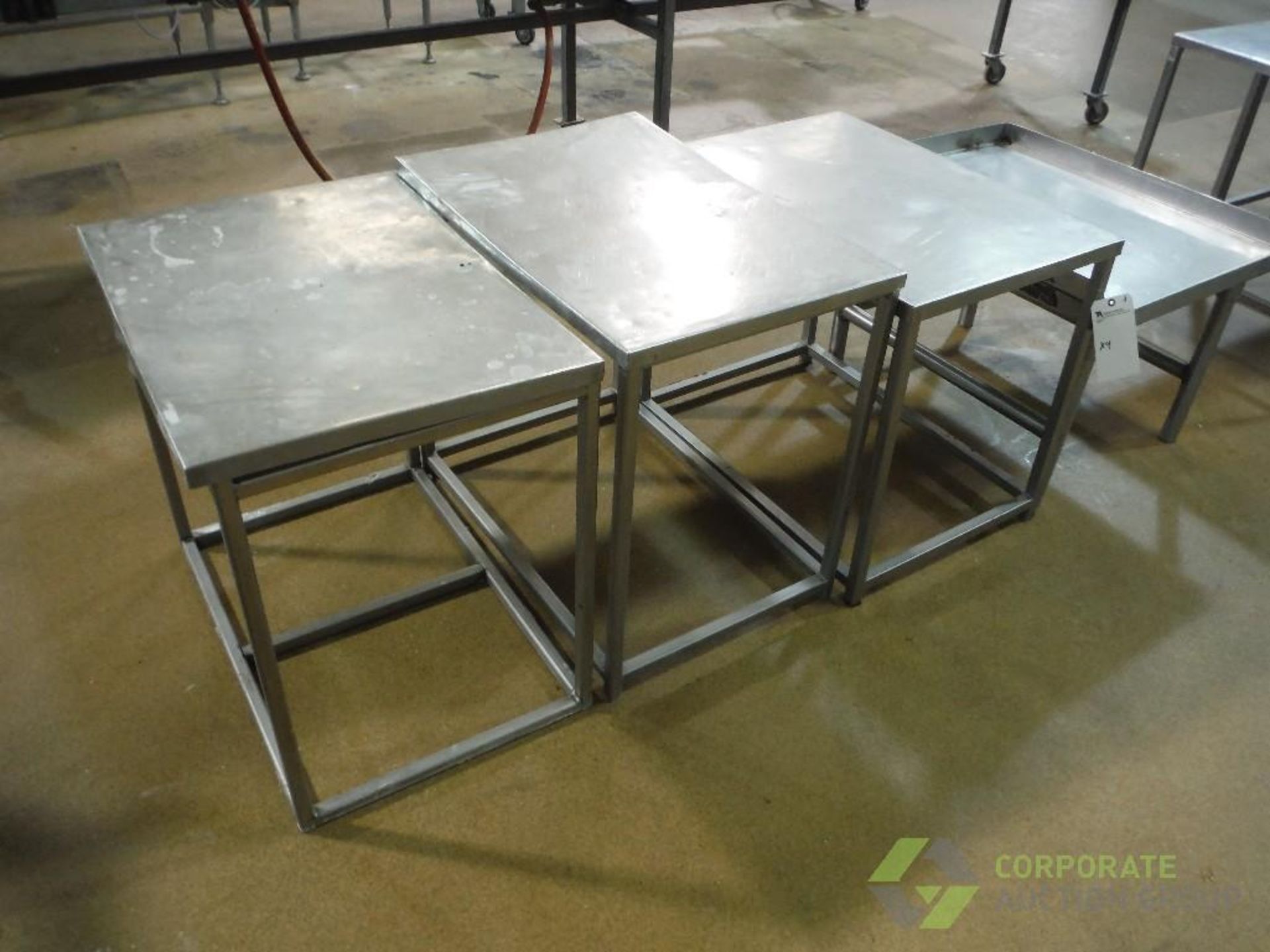 (4) assorted SS tables, approx. 30 in. long x 21 in. wide x 26 in. tall (LOT) - Image 3 of 3