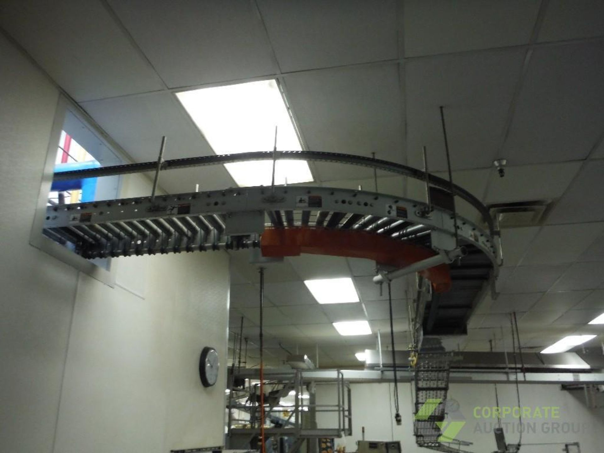 Overhead powered roller conveyor, approx. 60 ft. long x 16 in. wide, with approx. 30 ft. of skate - Image 6 of 7