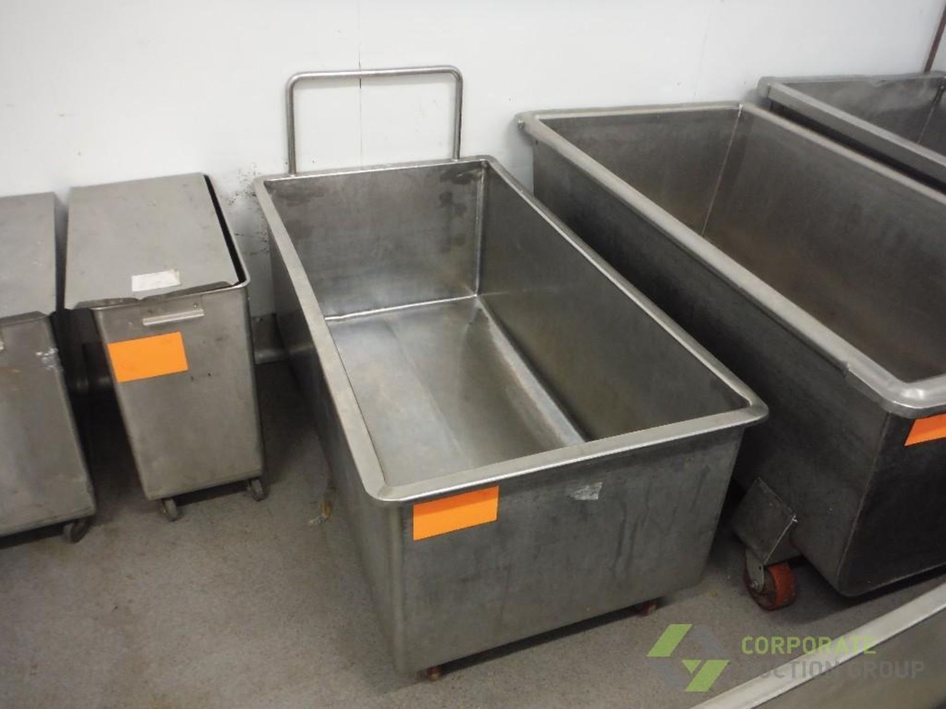 SS trough, 54 in. long x 28 in. wide x 21 in. tall, on casters