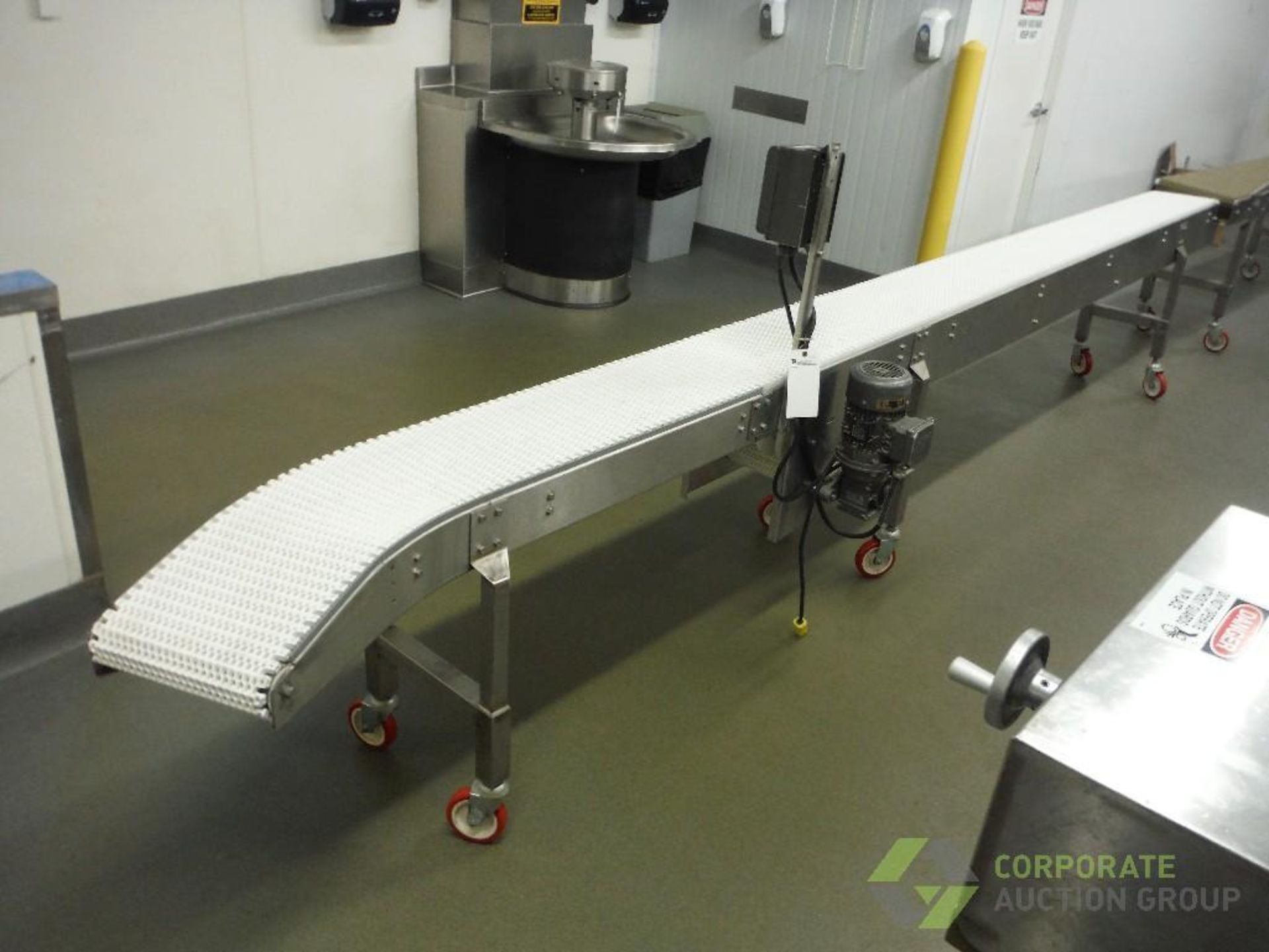 Belt conveyor, 17 ft. long x 12 in. wide x 32 in. tall, SS frame, motor and drive, on casters,