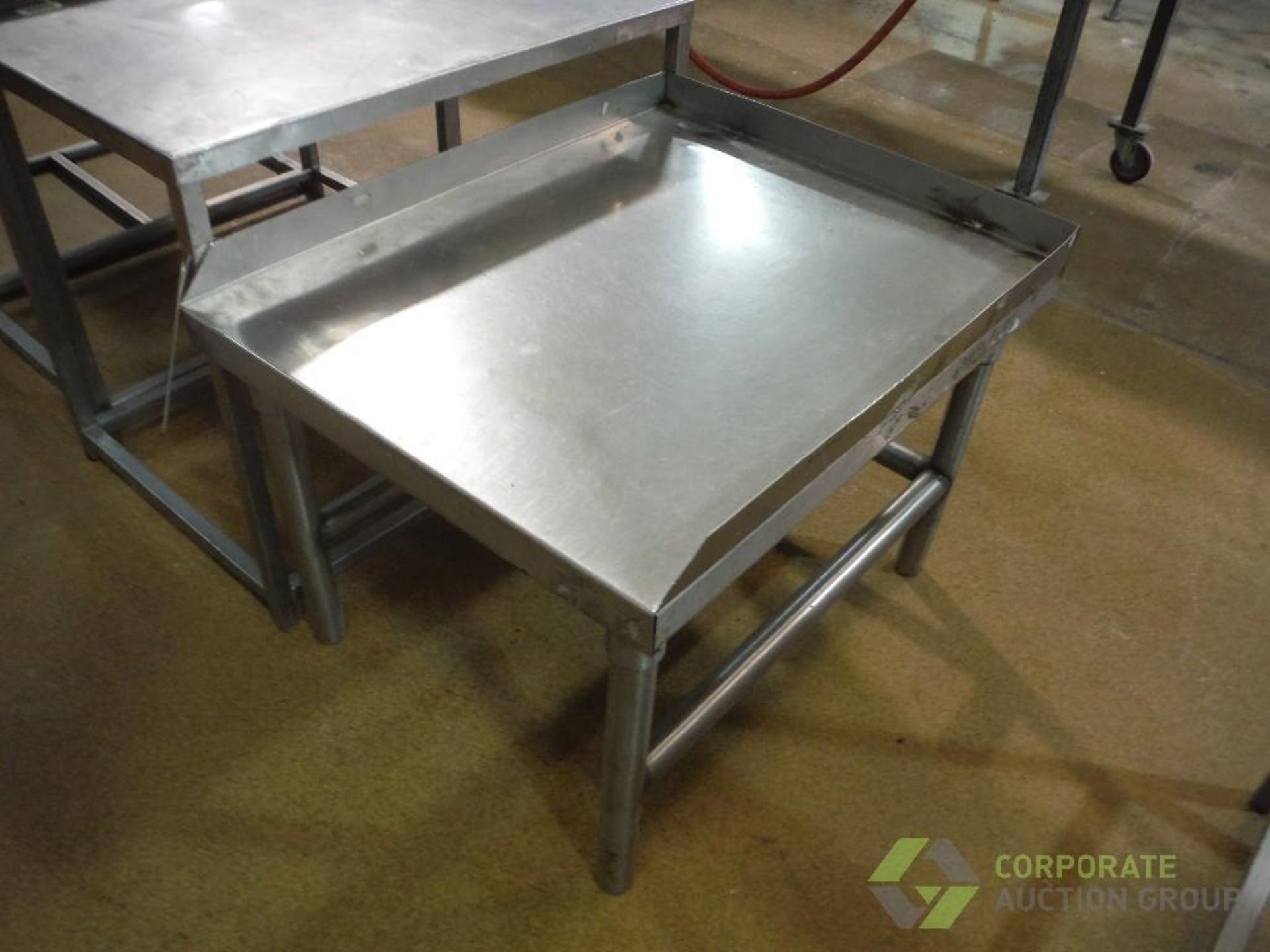 (4) assorted SS tables, approx. 30 in. long x 21 in. wide x 26 in. tall (LOT) - Image 2 of 3