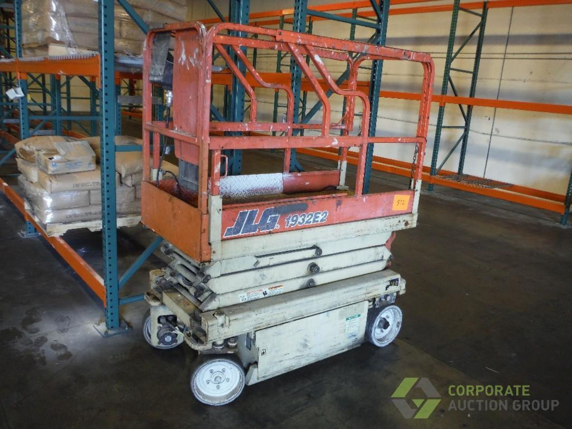 JLG scissors lift, Model 1932E2, on board charger