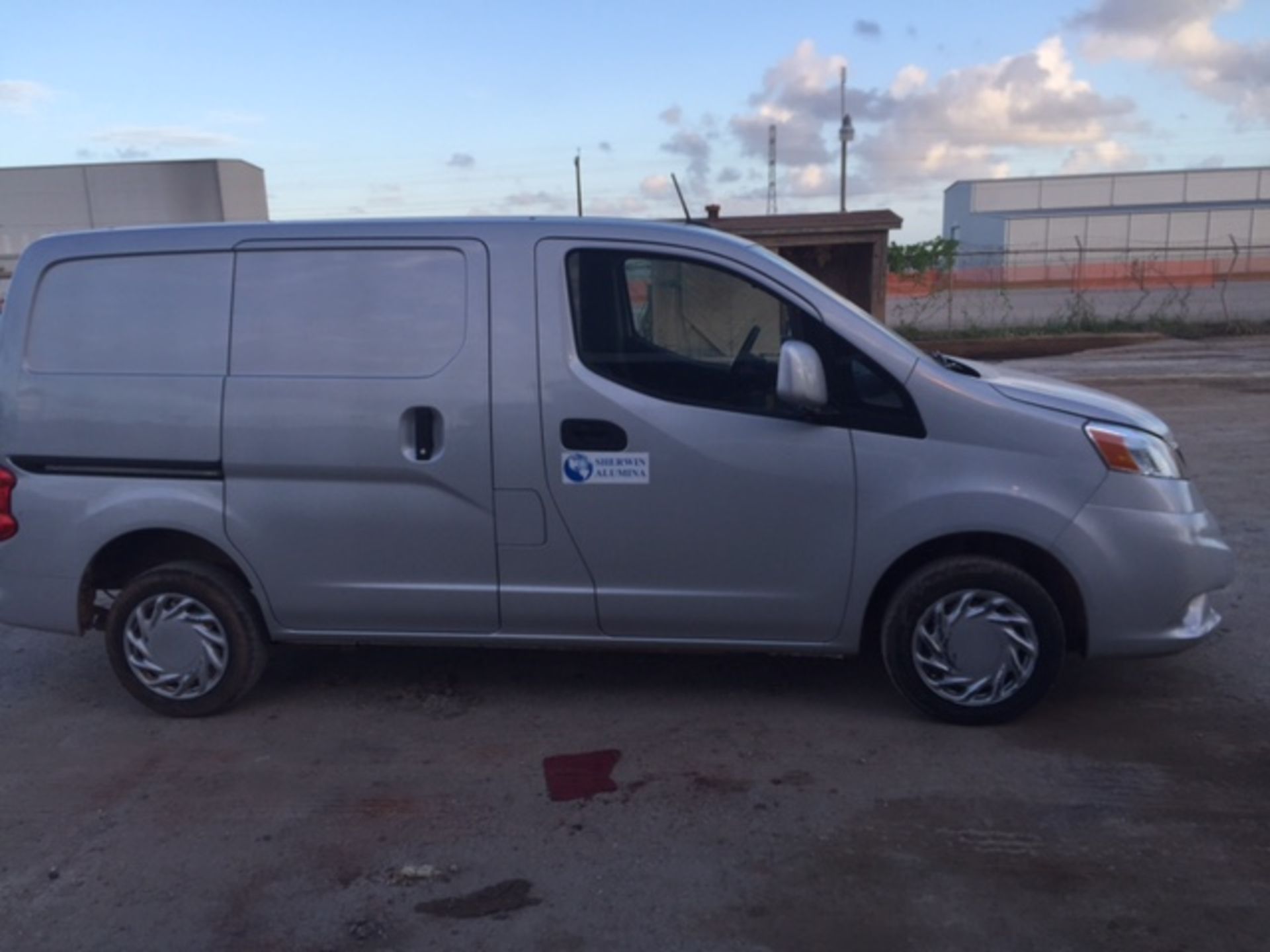 2014 Nissan NV200 Silver 5DR Cargo Van (Mileage 15,042), VIN: 3N6CM0KNEK691862, Has Dented Bumper