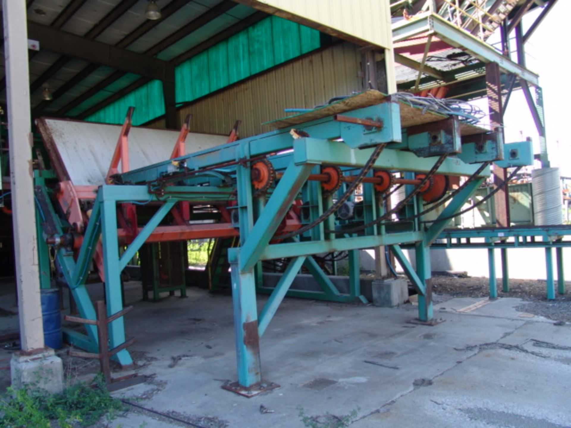 4 STRAND PACKAGE BREAKDOWN DECK, 12’W X 15’L; 10HP W/ CYCLO-DRIVE; 4 ARM HYDRAULIC TILT HOIST,