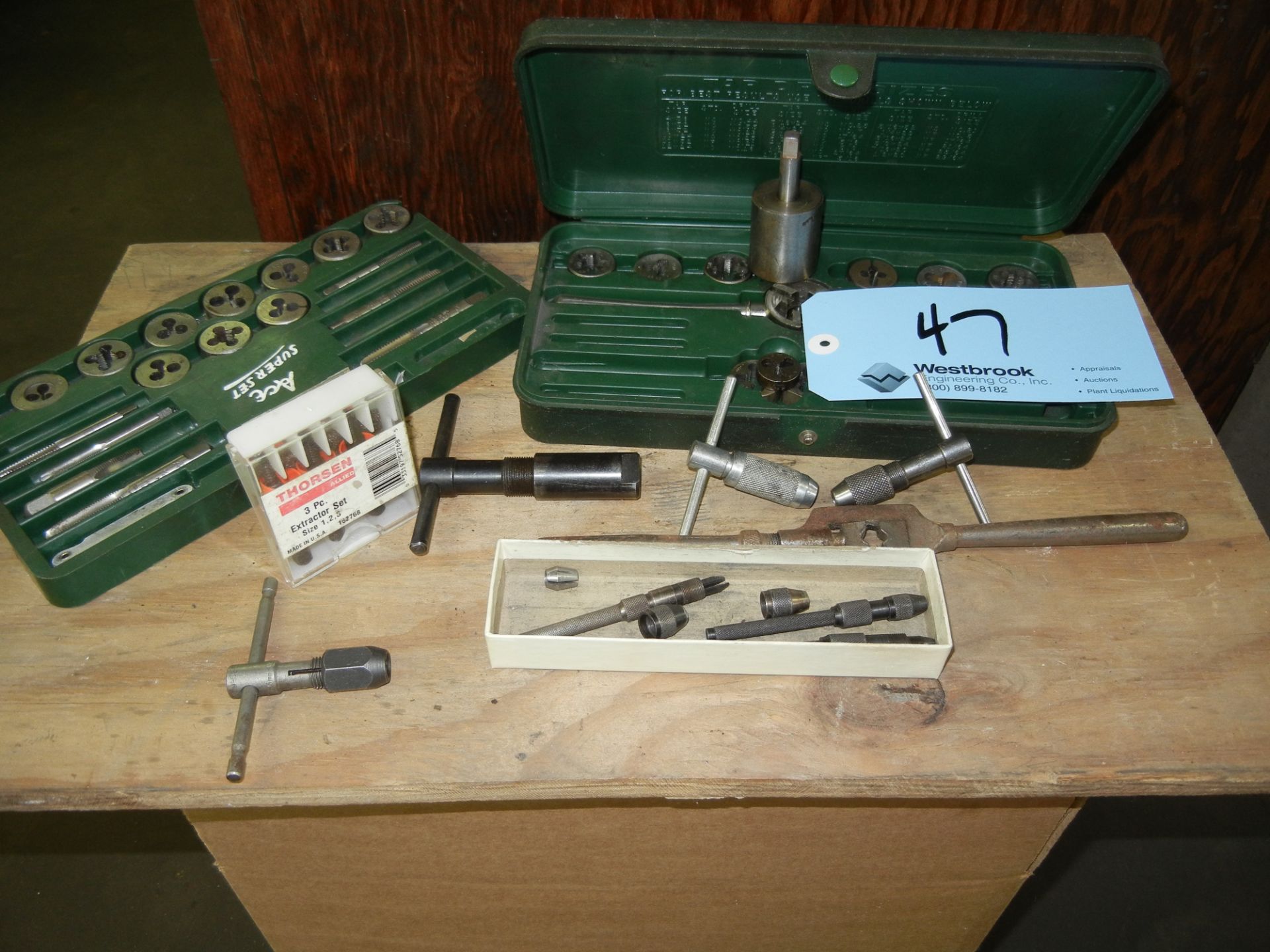 Tap and die set on table