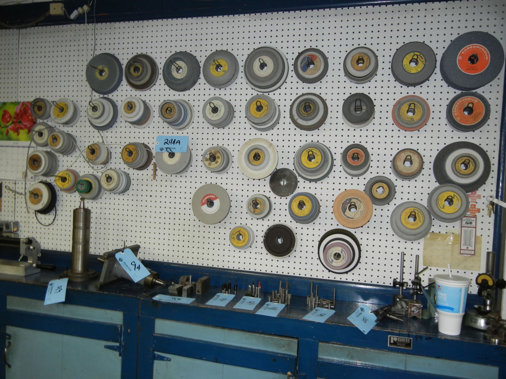 Peg board of grinding wheels