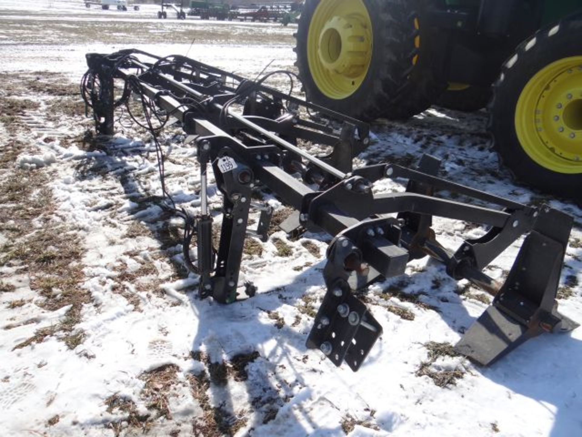 Lot 1199: Crop Sweeper Corn Reel 8 Row, Brackets for JD 600C, Control Box in the Shed