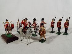 Britains diecast soldiers (and similar) - a collection of thirteen painted diecast model guardsmen