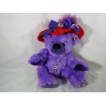 A Steiff bear, Trudy the Red Hat Society Bear, 40 cm (high) with associated ephemera,