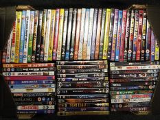 A collection of approximately 70 DVDs