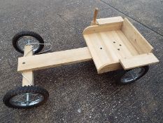 A good quality wooden go-cart by The Children's Furniture Company,
