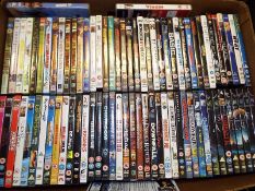 A collection of approximately 70 various DVDs
