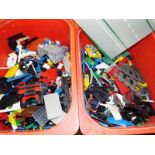 Two boxes containing a large quantity of Lego,