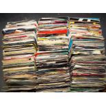 A large collection of in excess of 200 mixed single records to include pop and similar from the