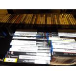 A collection of in excess of 60 computer games to include Playstation 2, PC games,